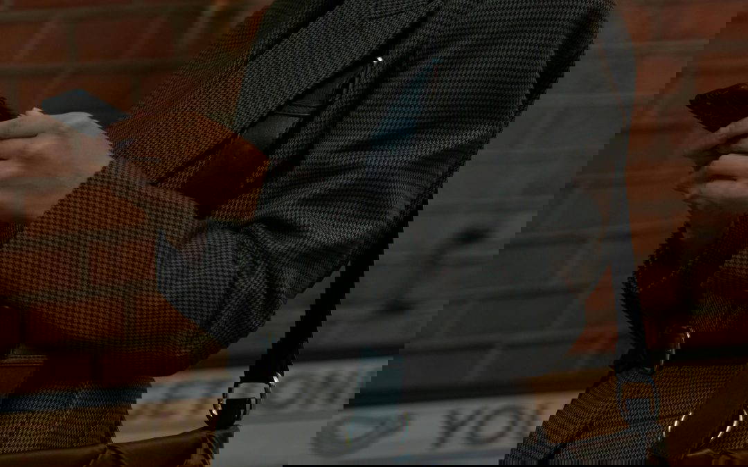 woman looking at mobile phone